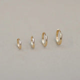 14K Solid Gold Seamless Huggie Hoop Earrings (Multiple Sizes) – Anygolds