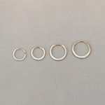 14K Solid Gold Seamless Huggie Hoop Earrings (Multiple Sizes) – Anygolds