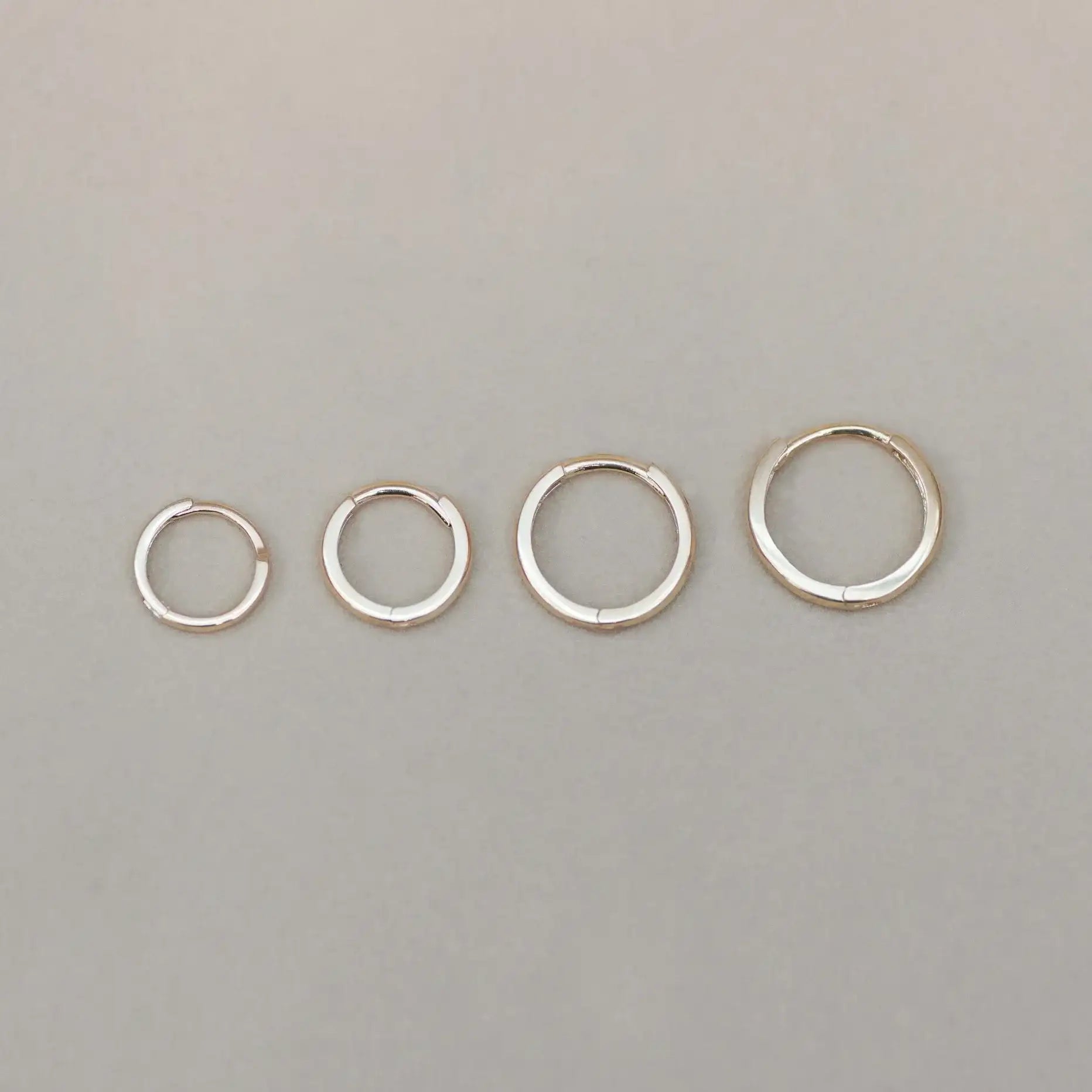 14K Solid Gold Seamless Huggie Hoop Earrings (Multiple Sizes) – Anygolds