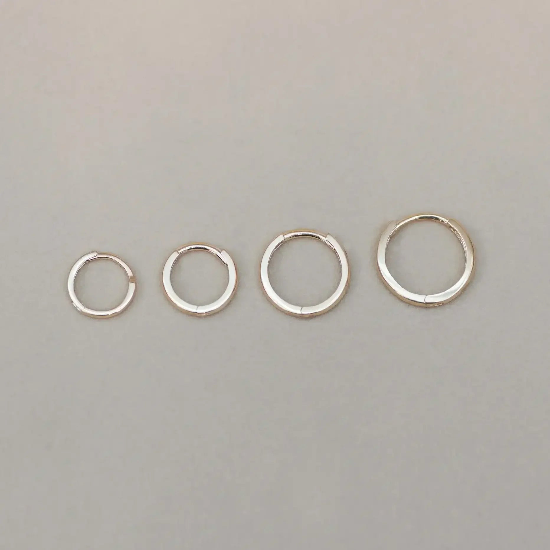 14K Solid Gold Seamless Huggie Hoop Earrings (Multiple Sizes) – Anygolds
