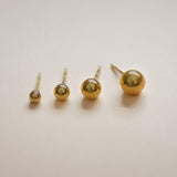 Pendientes redondos de bola de oro