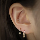 Piercings de oreja de circonita cúbica de oro macizo de 14 quilates