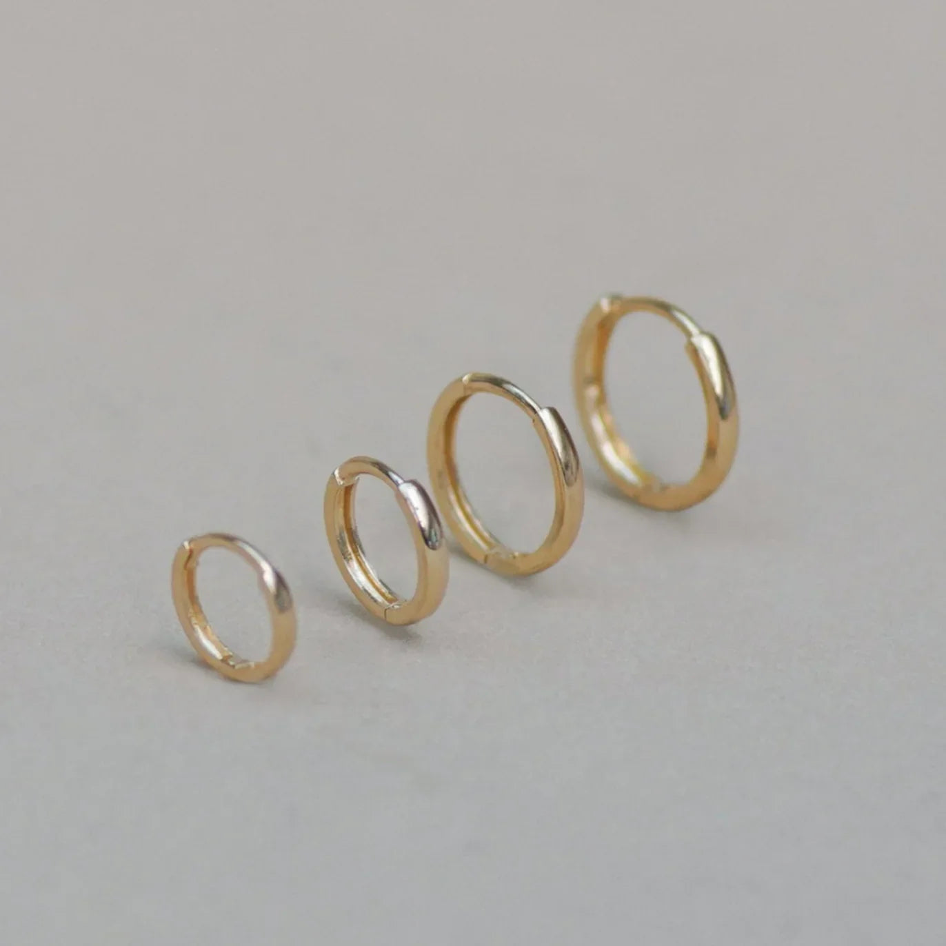 Seamless Huggie Hoop Earrings (Multiple Sizes) - Anygolds
