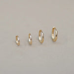 14K Solid Gold Seamless Huggie Hoop Earrings (Multiple Sizes) – Anygolds