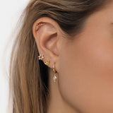 Piercing de aro Huggies con forma de rombo y circonita transparente